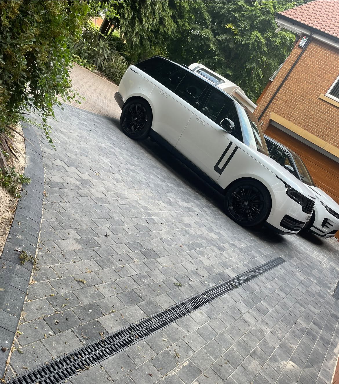 Charcoal block paving & drop kerb — detail 2